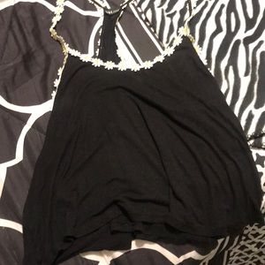 Wet Seal Other - I am selling a black shirt with sun flowers Wet Seal Other - I am selling a black shirt with sun flowers